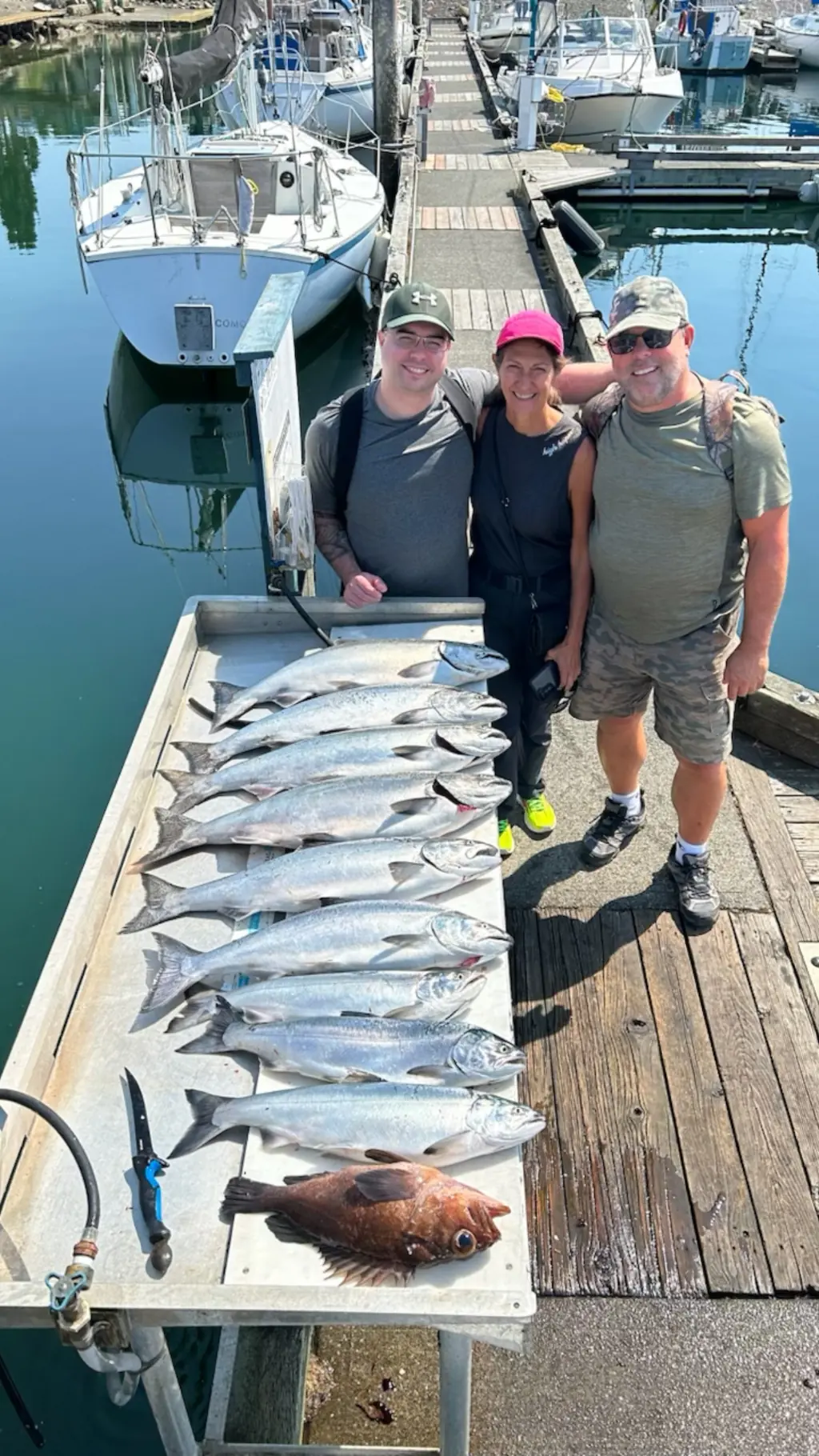 fishing charter group showing off their catch