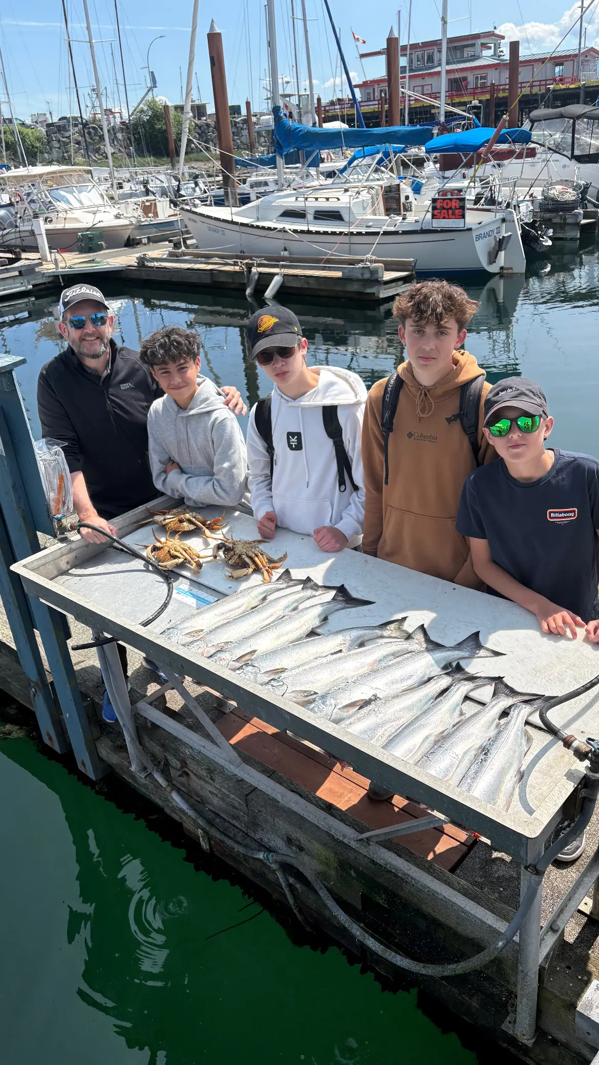 group of men displaying their catch from Cliff's Fishing Charter