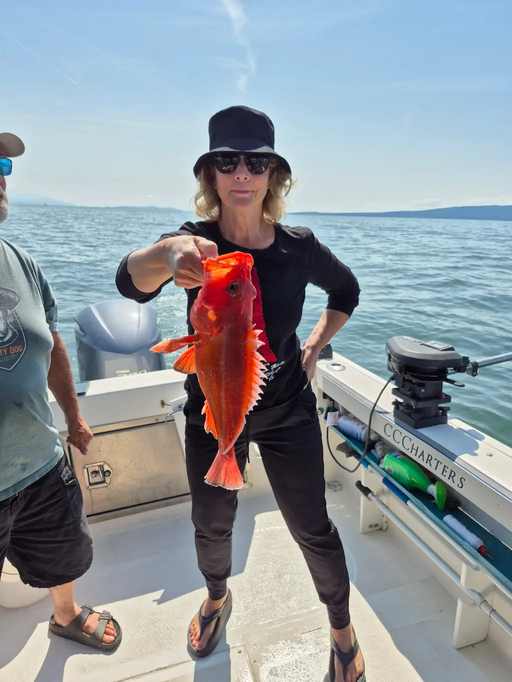woman showing off her catch in Campbell River